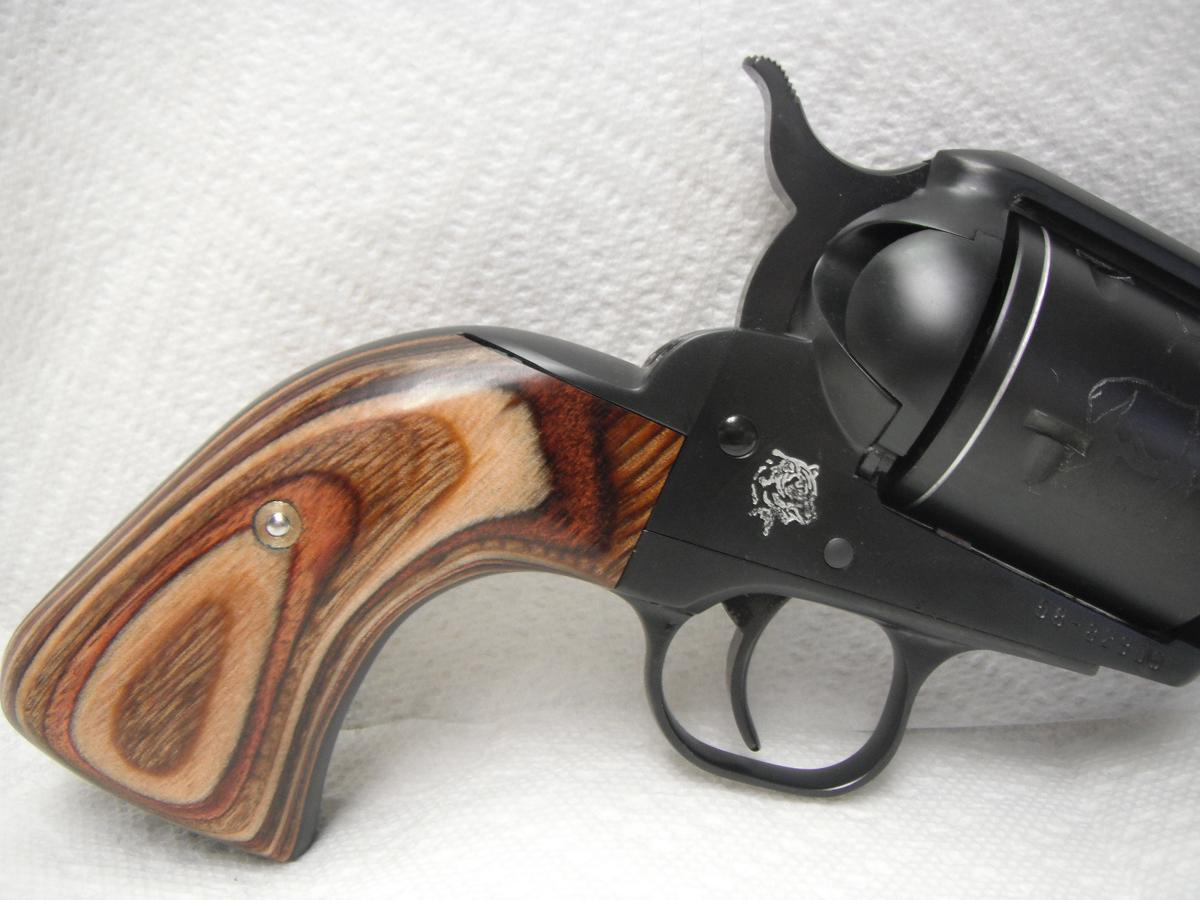 A close up of the side of a gun