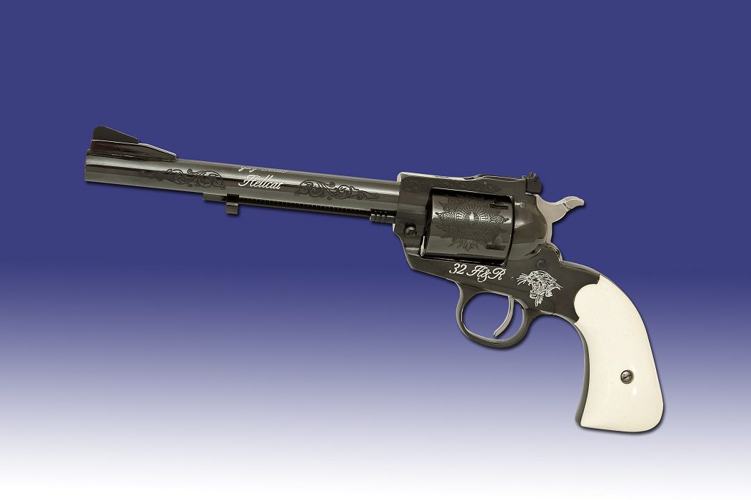 A gun with a white handle and black barrel.