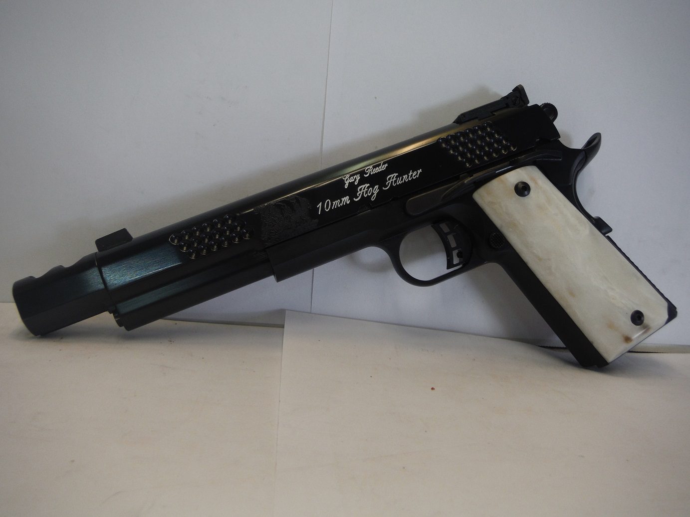 A gun that is sitting on the ground.