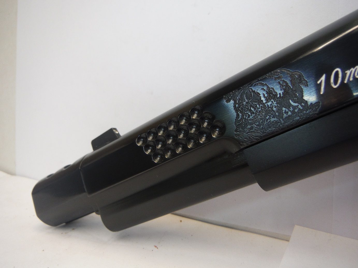 A close up of the remote control on a tv