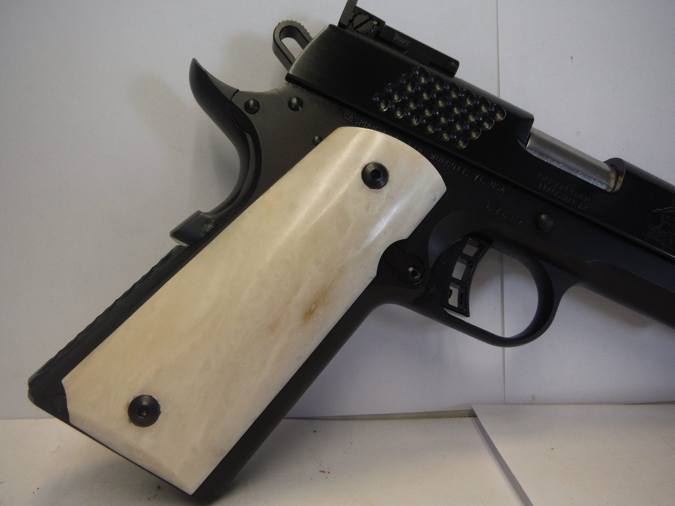 A gun that is sitting on the ground.