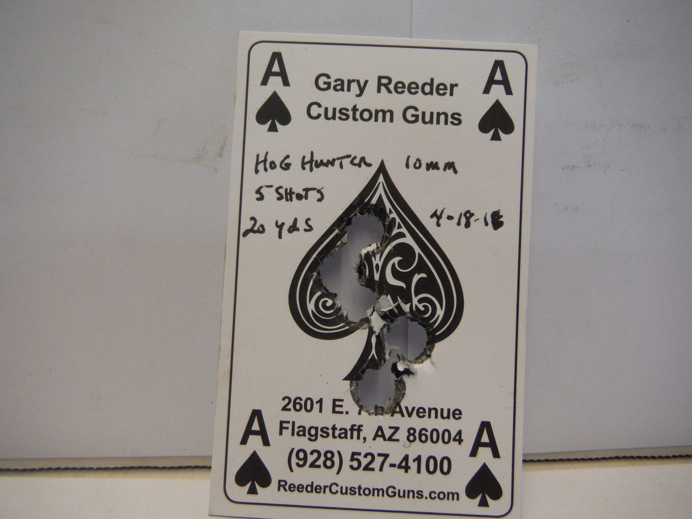A card with the ace of spades on it.