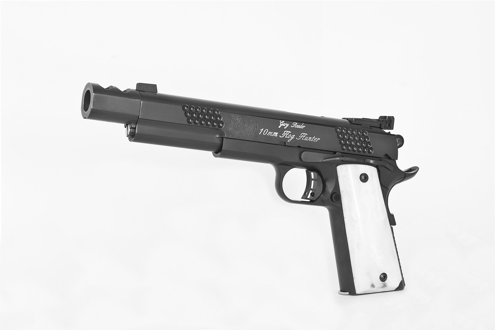 hog hunter 3 A black and white picture of an 1 9 1 1 pistol.