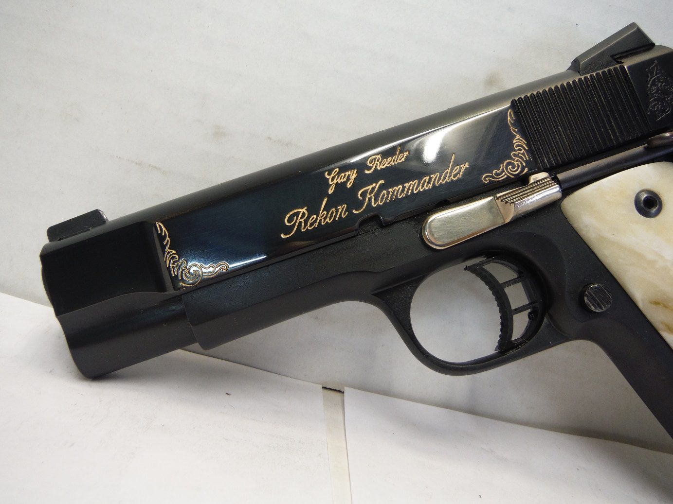 A close up of the side of a gun