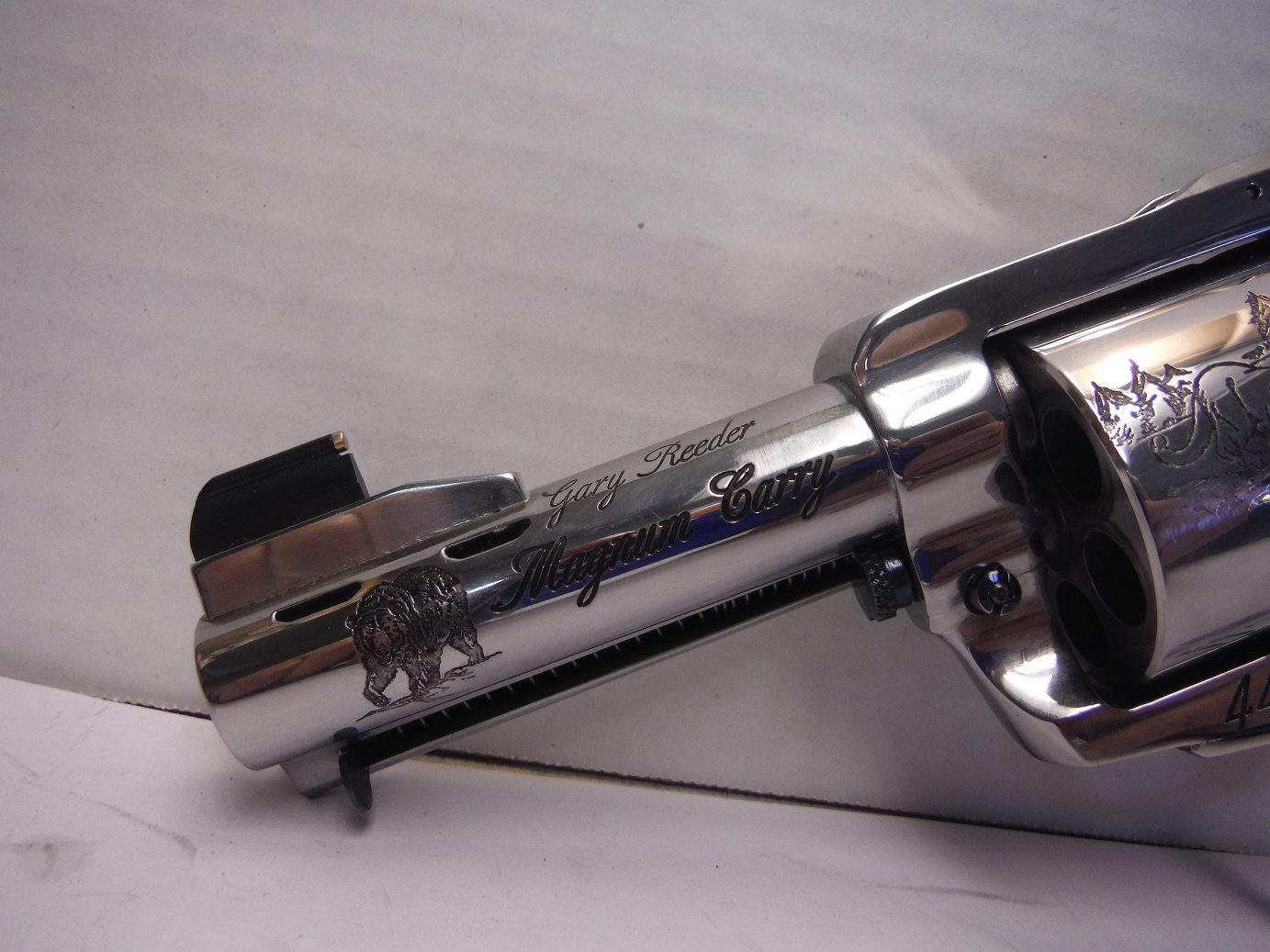A close up of the side of a gun
