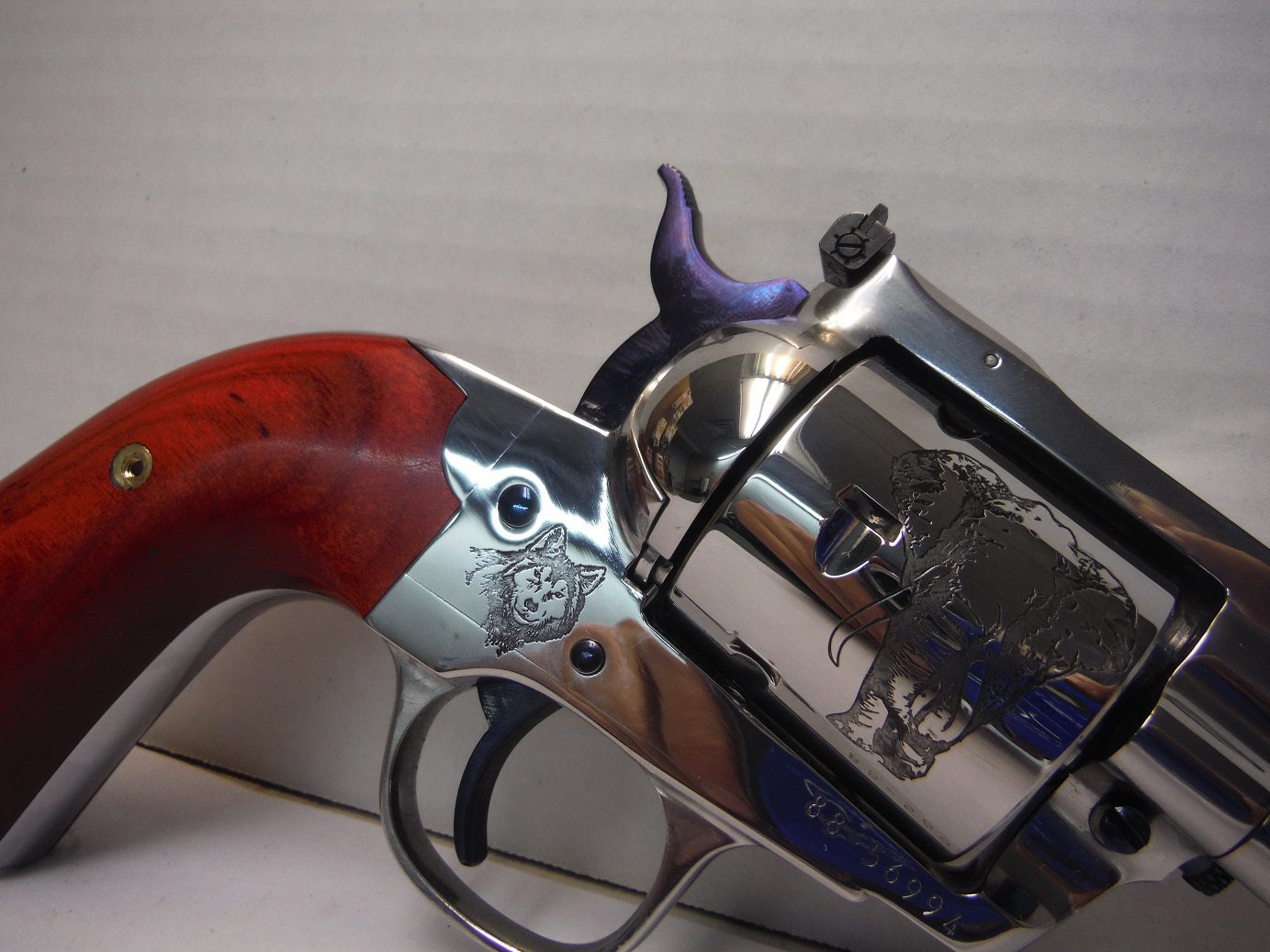 A close up of the side of a gun