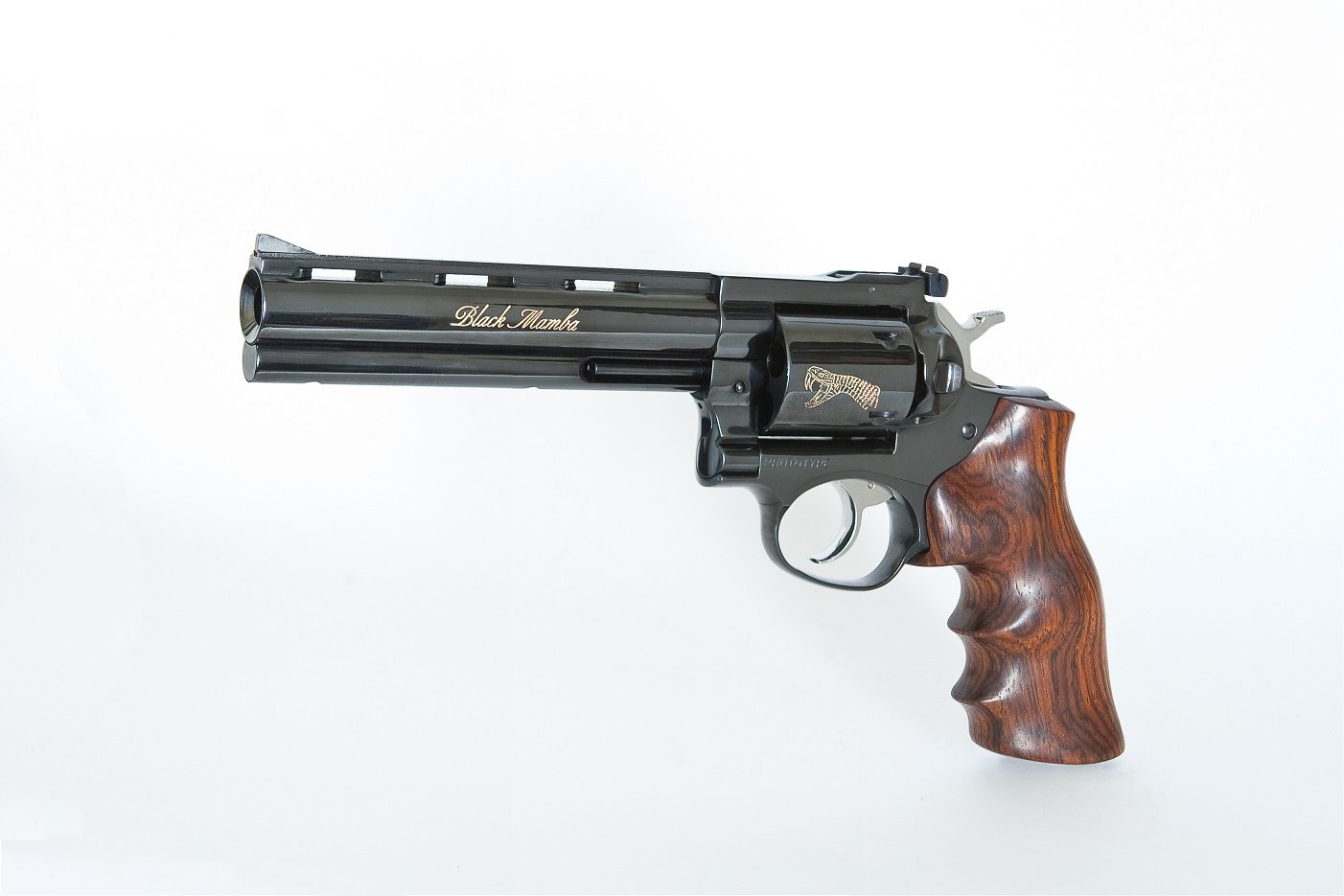 A black and silver gun with wooden grips