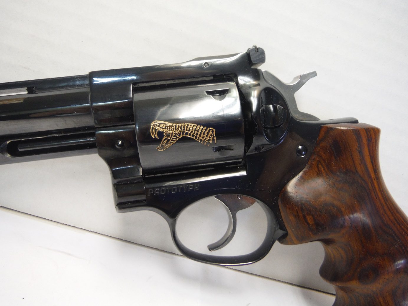 A close up of the side of a gun