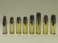 medium bore_small A row of different types of bullets lined up.