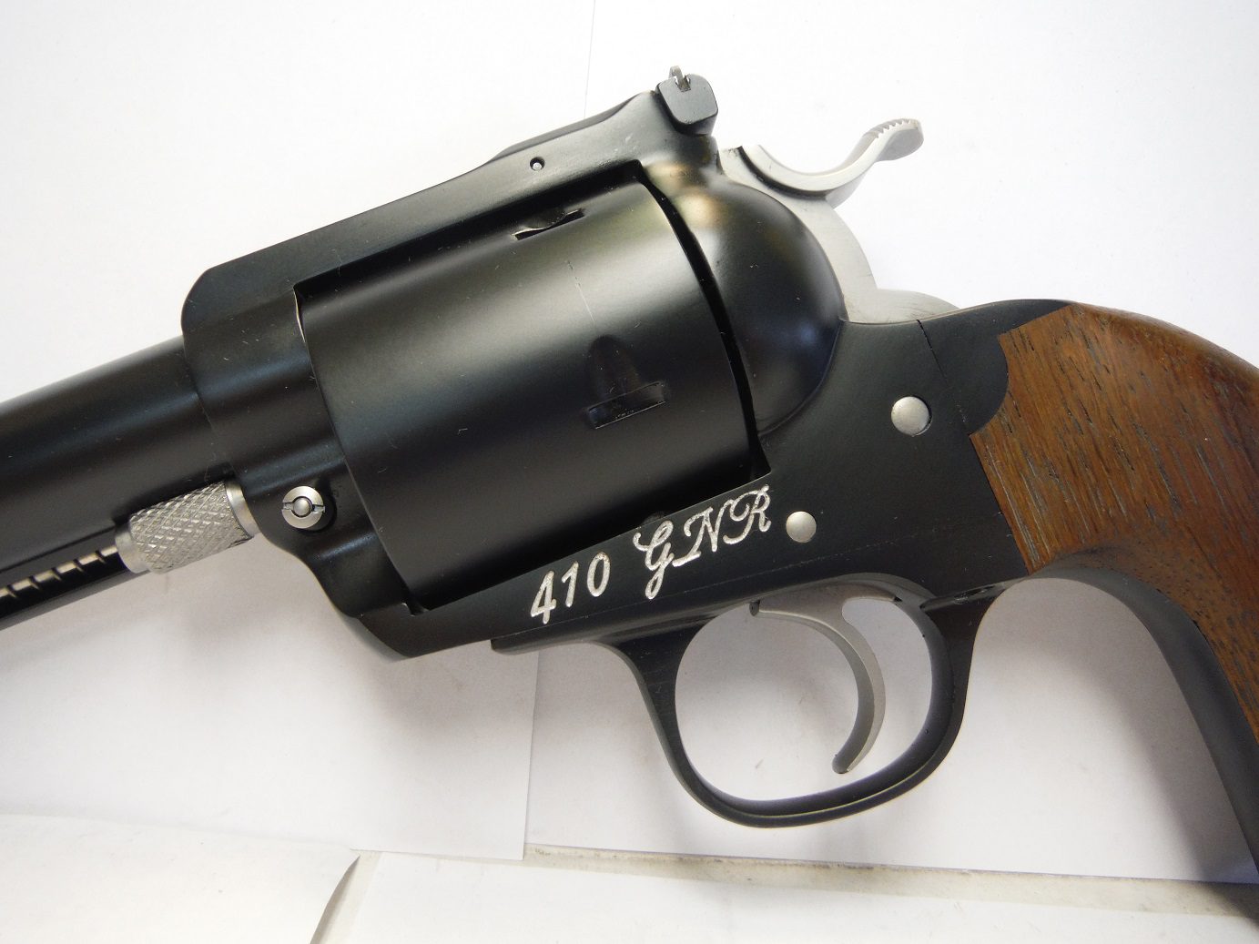 A close up of the side of a gun