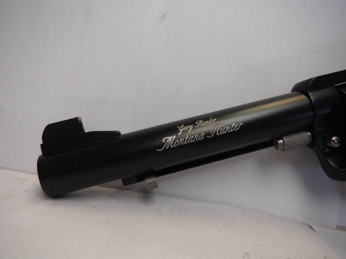 A close up of the side of a gun