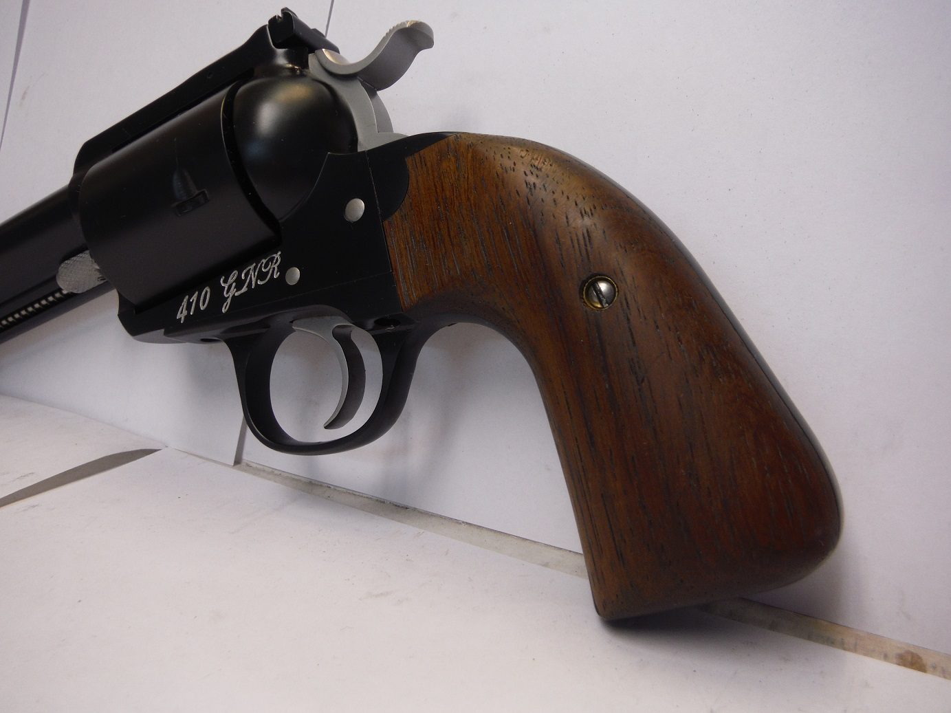 A gun that is sitting on the ground.