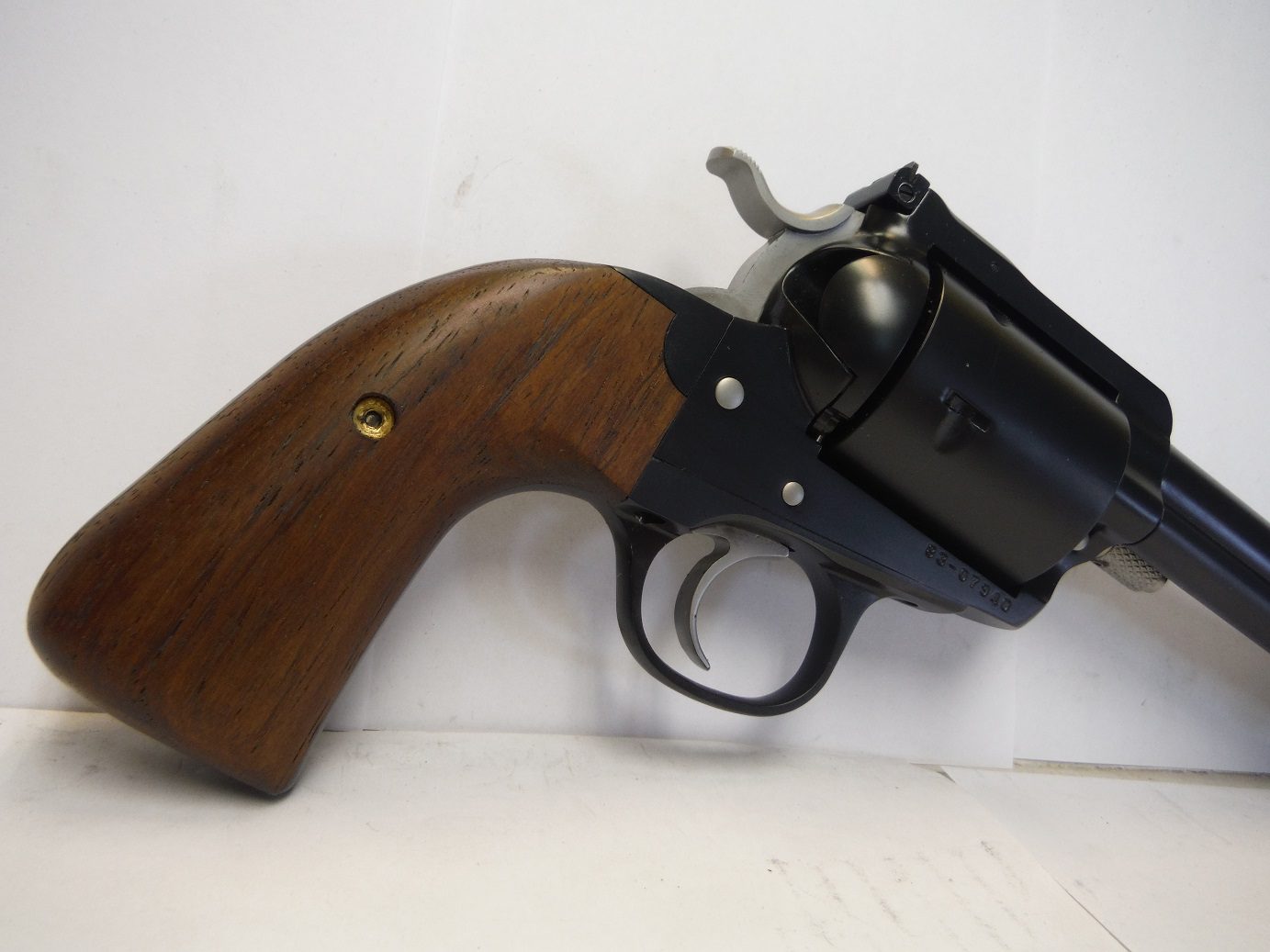 A gun that is sitting on the ground.
