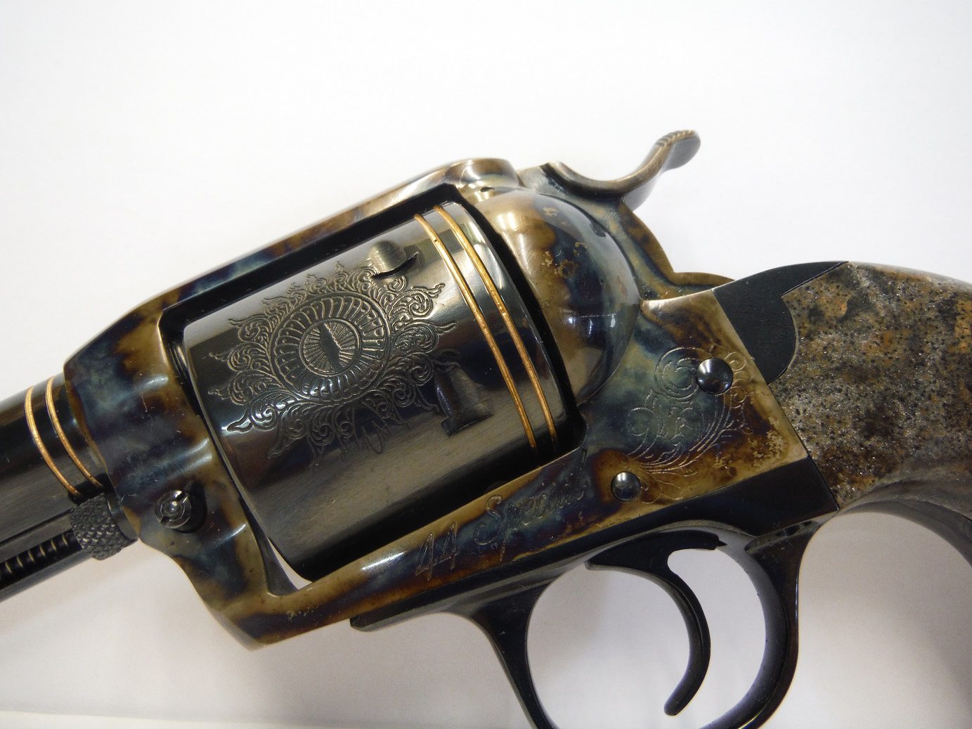 A close up of the top part of an old gun.