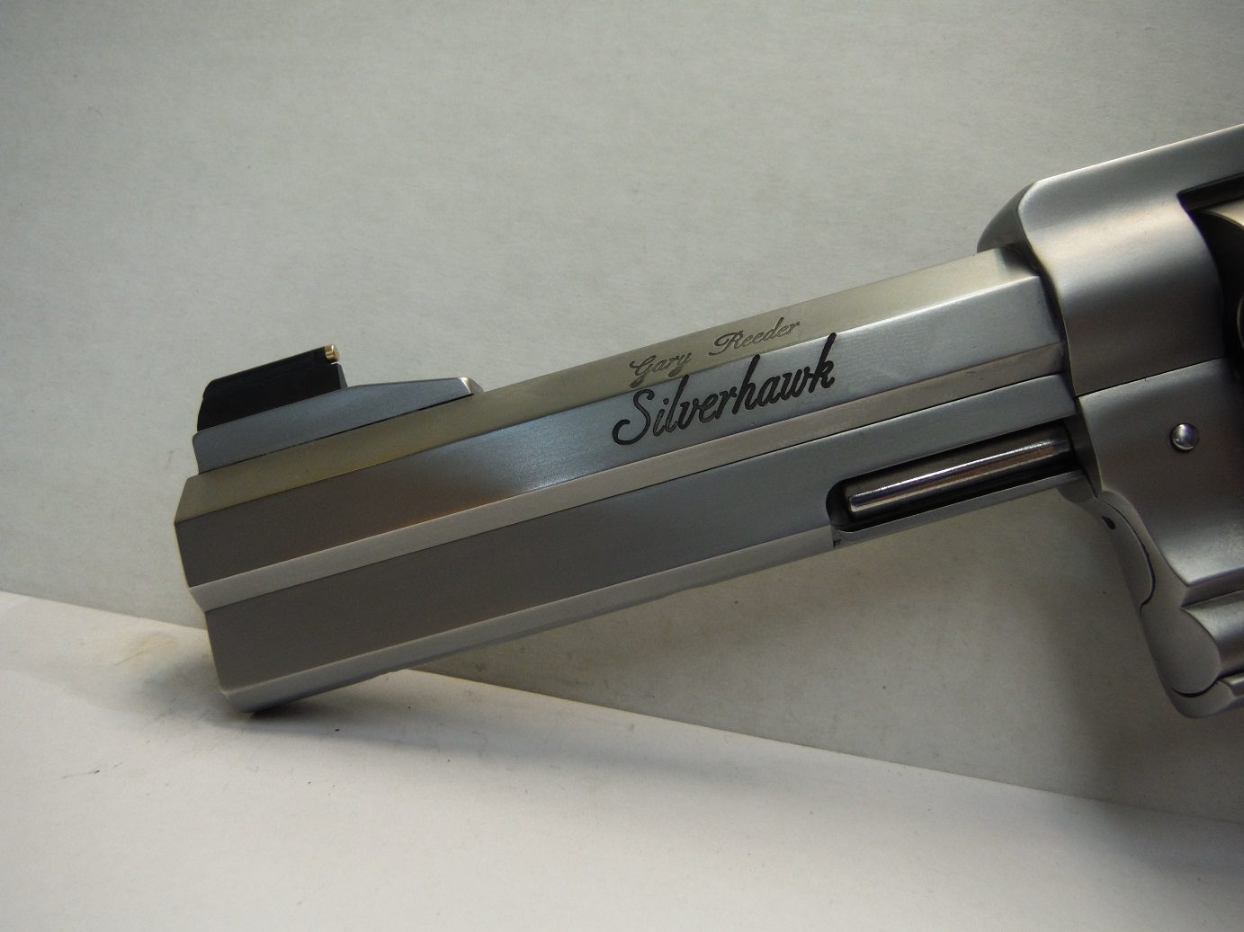 A close up of the side of a gun
