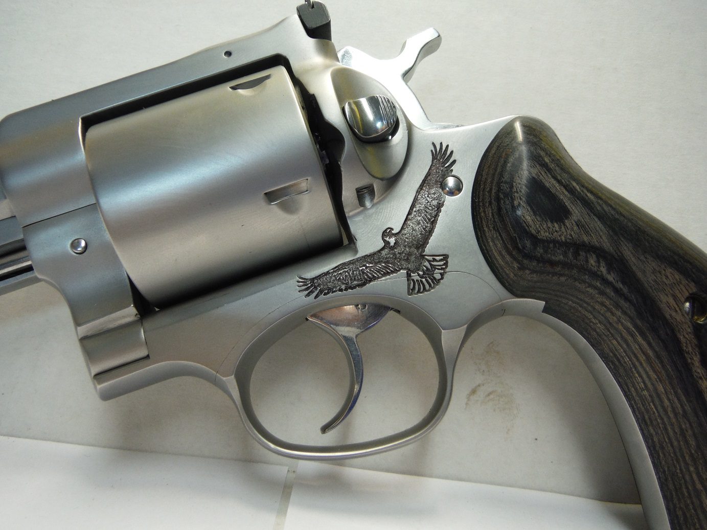 A close up of the side of a gun