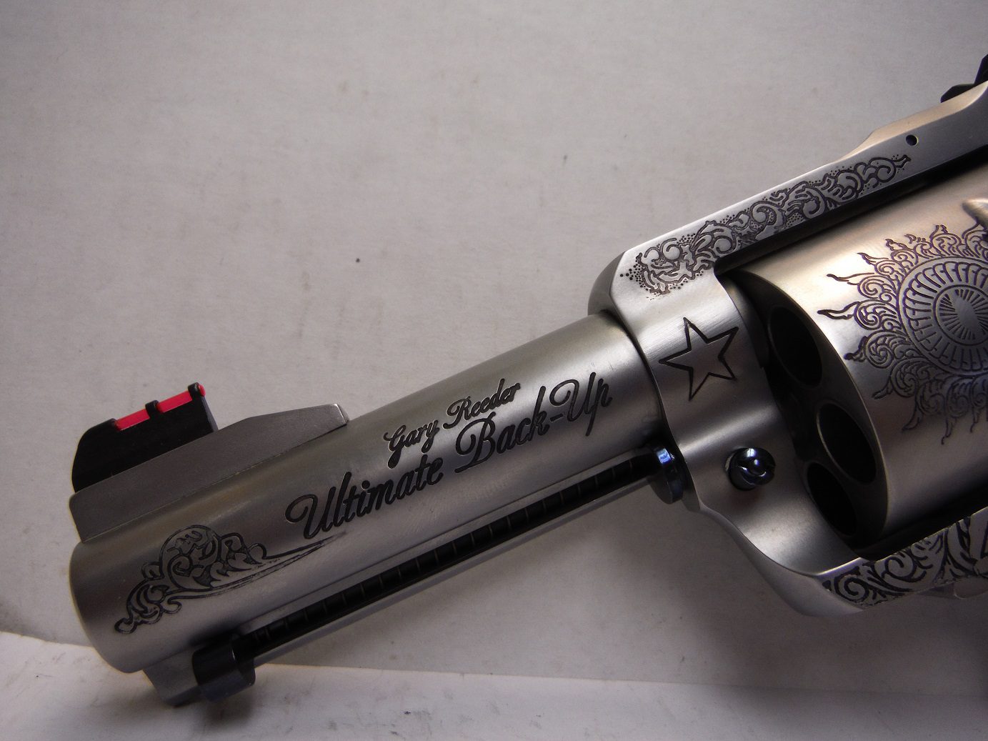 A close up of the side of a gun