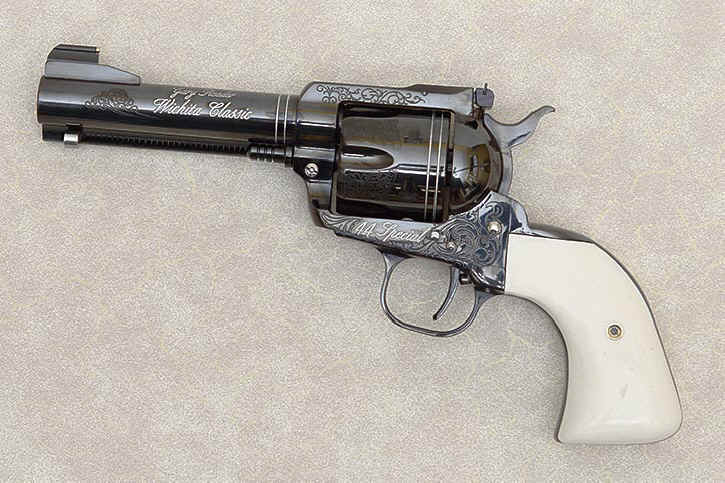 wichitaclassic2 A gun that is on the ground with its handle up.